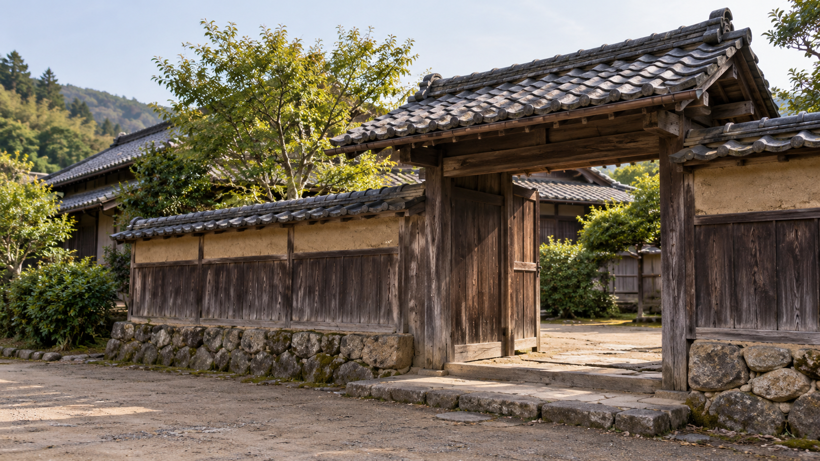 瓦屋根と石の基礎を備えた木造の門を描く創作景観
