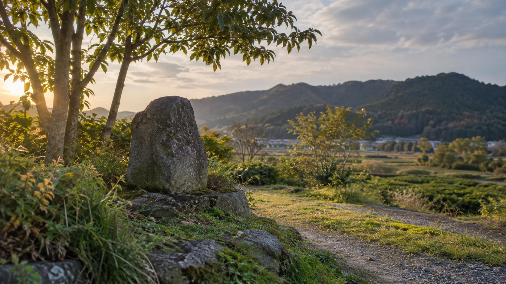 石の目印と道、遠くの山を描いた現代の記憶の概念風景